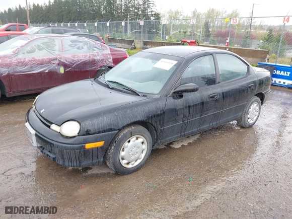1997 Dodge Neon with VIN 1B3ES27C3VD261832, listed as a IAAI auction lot 41964028 with 220,237 mi miles. Bid and sale history available at carsss.com. Image 2.