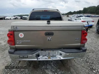 2006 Dodge Dakota SLT with VIN 1D7HE48N66S641149, listed as a Copart auction lot 58823615 with 169,002 mi miles and Salvage title. Bid and sale history available at DreamBid. Image 6.