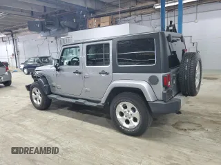 2015 Jeep Wrangler Unlimited Sahara with VIN 1C4BJWEG5FL743663, listed as a Copart auction lot 60205225 with 69,922 mi miles and Salvage title. Bid and sale history available at DreamBid. Image 2.