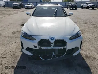 2022 BMW i4 eDrive40 with VIN WBY73AW09NFM42460, listed as a Copart auction lot 59141474 with 0 mi miles and Salvage Title. Bid and sale history available at carsss.com. Image 5.