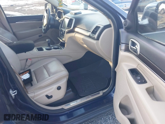 2014 Jeep Grand Cherokee Limited with VIN 1C4RJEBT0EC513098, listed as a IAAI auction lot 41324750 with 213,306 mi miles and . Bid and sale history available at DreamBid. Image 5.