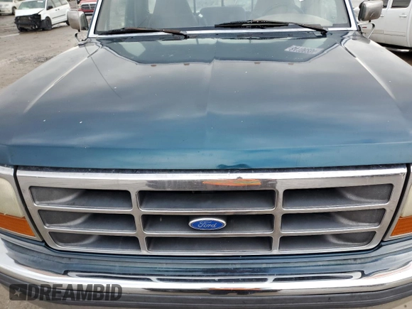 1997 Ford F-350 with VIN 1FTHF36G8VEB56577, listed as a Copart auction lot 84106284 with 126,868 mi miles and Salvage title. Bid and sale history available at DreamBid. Image 13.