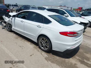2020 Ford Fusion SEL with VIN 3FA6P0CD3LR152711, listed as a IAAI auction lot 42516763 with 97,073 mi miles and . Bid and sale history available at DreamBid. Image 3.