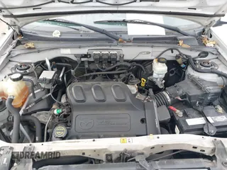 2005 Mazda Tribute LX with VIN 4F2CZ94105KM25420, listed as a IAAI auction lot 41450750 with 148,736 mi miles. Bid and sale history available at carsss.com. Image 10.