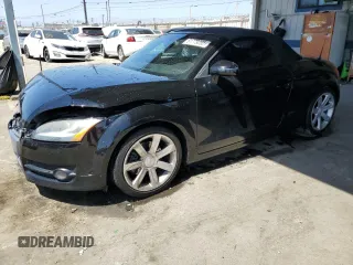 2008 Audi TT 2.0T with VIN TRUMF38J481034405, listed as a Copart auction lot 61779265 with 104,271 mi miles and Salvage title. Bid and sale history available at DreamBid. Image 1.