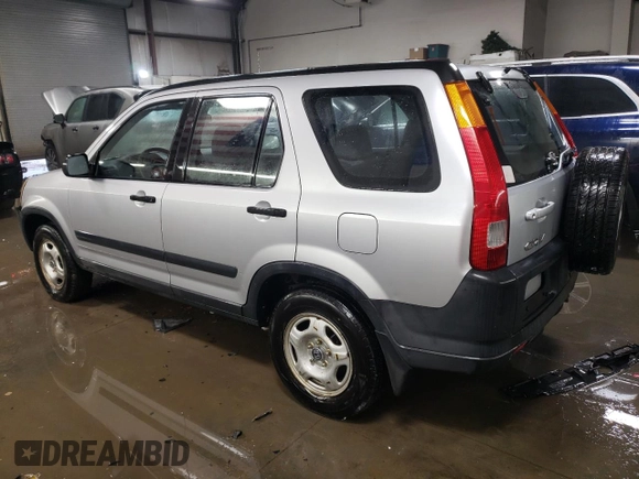 2002 Honda CR-V LX with VIN JHLRD68512C009941, listed as a Copart auction lot 87699075 with 133,311 mi miles and Salvage Title. Bid and sale history available at DreamBid. Image 2.