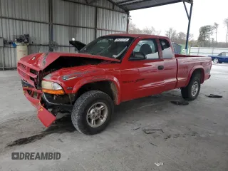 1999 Dodge Dakota SLT with VIN 1B7GG22Y5XS276472, listed as a Copart auction lot 85417774 with 264,833 mi miles and Salvage Title. Bid and sale history available at carsss.com. Image 1.