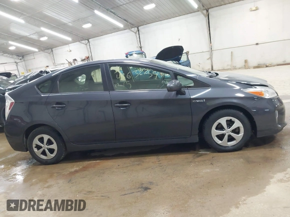 2015 Toyota Prius Four with VIN JTDKN3DU9F0479021, listed as a IAAI auction lot 42632754 with 77,400 mi miles and . Bid and sale history available at DreamBid. Image 13.