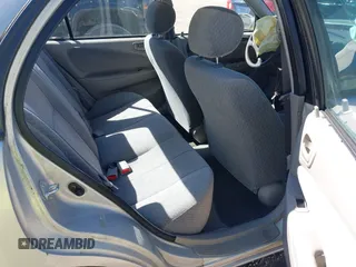 2002 Toyota Corolla CE with VIN 1NXBR12E92Z654340, listed as a IAAI auction lot 41805390 with 62,899 mi miles and . Bid and sale history available at DreamBid. Image 8.