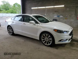 2017 Ford Fusion Titanium with VIN 3FA6P0D99HR138992, listed as a Copart auction lot 58421995 with 24,057 mi miles and Salvage title. Bid and sale history available at DreamBid. Image 4.