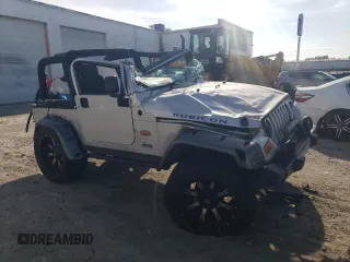 2003 Jeep Wrangler Rubicon z VIN 1J4FA69S53P375189, wystawiony jako Copart lot #54292035 z przebiegiem 55 863 mil mil oraz Szkoda całkowita • Salvage title. Historia ofert i sprzedaży dostępna na DreamBid. Obrazek 4.
