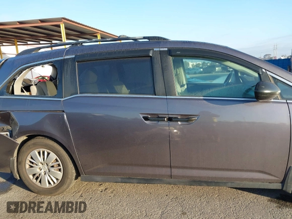 2015 Honda Odyssey LX с VIN 5FNRL5H27FB068761, выставлен на аукционе IAAI как лот 41479420 с пробегом 84 532 миль миль и . История ставок и продаж доступна на DreamBid. Изображение 13.