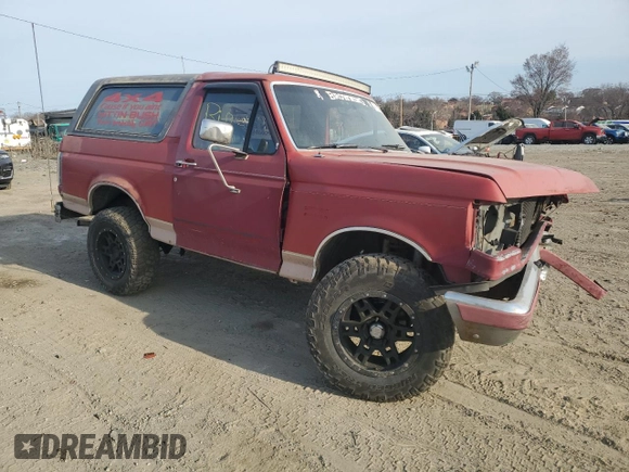 1989 Ford Bronco XL with VIN 1FMEU15N6KLB03828, listed as a Copart auction lot 48118625 with 258,907 mi miles and Salvage Title. Bid and sale history available at DreamBid. Image 4.