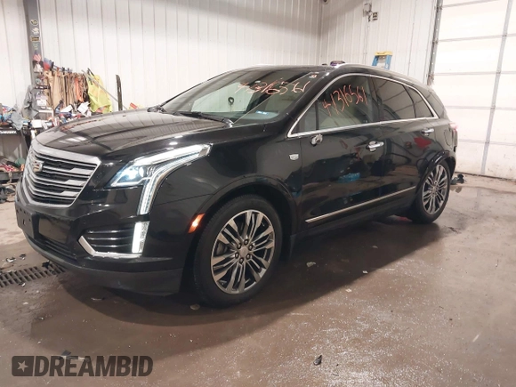 2019 Cadillac XT5 Premium Luxury AWD z VIN 1GYKNFRSXKZ189590, wystawiony jako IAAI lot #41316561 z przebiegiem 98 755 mil mil oraz . Historia ofert i sprzedaży dostępna na DreamBid. Obrazek 2.