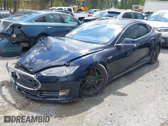 2014 Tesla Model S 60 with VIN 5YJSA1H15EFP43884, listed as a IAAI auction lot 41993180 with 78,305 mi miles and . Bid and sale history available at DreamBid. Image 2.
