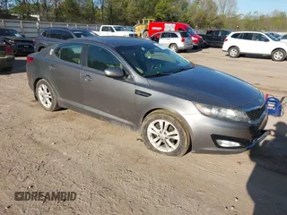 2012 Kia Optima EX z VIN 5XXGN4A71CG079247, wystawiony jako IAAI lot #42008439 z przebiegiem 213 925 mil mil oraz . Historia ofert i sprzedaży dostępna na DreamBid. Obrazek 1.