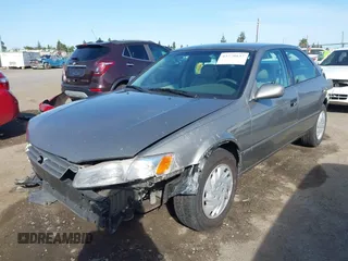 1997 Toyota Camry LE z VIN 4T1BF22K1VU025776, wystawiony jako IAAI lot #42270137 z przebiegiem 168 299 mil mil oraz . Historia ofert i sprzedaży dostępna na DreamBid. Obrazek 21.