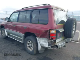 1998 Mitsubishi Montero z VIN JA4MR51RXWJ003468, wystawiony jako IAAI lot #41916695 z przebiegiem 214 694 mil mil oraz . Historia ofert i sprzedaży dostępna na DreamBid. Obrazek 3.
