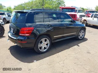 2013 Mercedes-Benz GLK-Class GLK 350 with VIN WDCGG5HB9DF974618, listed as a IAAI auction lot 41865083 with 142,850 mi miles. Bid and sale history available at carsss.com. Image 4.