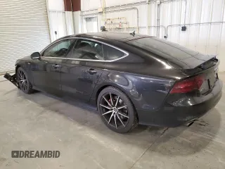 2012 Audi A7 Prestige с VIN WAU3GAFC8CN123100, выставлен на аукционе Copart как лот 59881965 с пробегом 102 213 миль миль и На запчасти • Non repairable. История ставок и продаж доступна на DreamBid. Изображение 2.