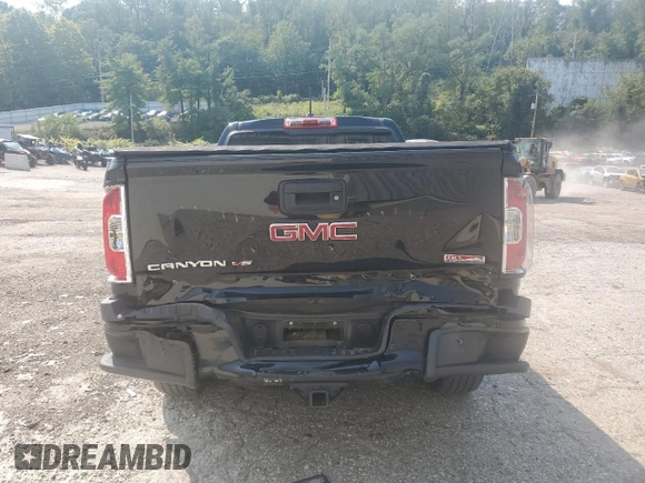 2018 GMC Canyon 4WD All Terrain w/Cloth with VIN 1GTG6CEN0J1301365, listed as a Copart auction lot 69886294 with 61,857 mi miles and Salvage Title. Bid and sale history available at carsss.com. Image 6.