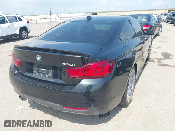 2020 BMW 4 Series 430i with VIN WBA4W3C03LFH21833, listed as a IAAI auction lot 42432388 with Not provided miles and . Bid and sale history available at DreamBid. Image 4.