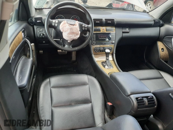 2007 Mercedes-Benz C 230 Sport with VIN WDBRF52H77E026905, listed as a Copart auction lot 58012235 with 148,975 mi miles and Salvage title. Bid and sale history available at DreamBid. Image 8.