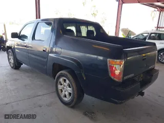2006 Honda Ridgeline RTL with VIN 2HJYK16556H566886, listed as a IAAI auction lot 42077035 with 124,310 mi miles. Bid and sale history available at carsss.com. Image 3.
