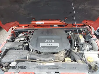 2015 Jeep Wrangler Unlimited Sahara with VIN 1C4BJWEG6FL603265, listed as a IAAI auction lot 41956606 with 70,983 mi miles. Bid and sale history available at carsss.com. Image 10.