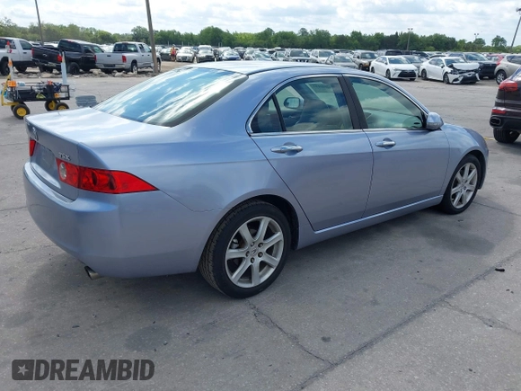 2004 Acura TSX w/Navigation with VIN JH4CL96944C045735, listed as a IAAI auction lot 42042197 with 197,900 mi miles. Bid and sale history available at carsss.com. Image 4.