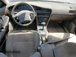 1993 Nissan Maxima z VIN JN1HJ01F6PT114020, wystawiony jako Copart lot #61137914 z przebiegiem 230 999 mil mil oraz Tytuł czysty. Historia ofert i sprzedaży dostępna na DreamBid. Obrazek 8.