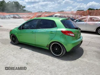2012 Mazda 2 Sport with VIN JM1DE1KZ5C0141784, listed as a Copart auction lot 56498295 with 132,602 mi miles and Salvage Title. Bid and sale history available at DreamBid. Image 2.