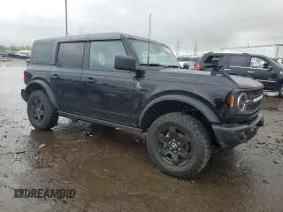 2023 Ford Bronco with VIN 1FMEE5BP5PLB05040, listed as a Copart auction lot 55619375 with 25,856 mi miles and Salvage title. Bid and sale history available at DreamBid. Image 4.