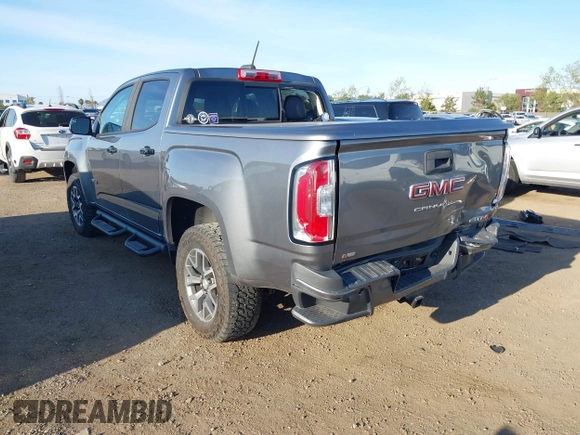 2021 GMC Canyon 4WD AT4 w/Leather with VIN 1GTG6FEN9M1123638, listed as a IAAI auction lot 41852163 with 77,442 mi miles. Bid and sale history available at carsss.com. Image 3.