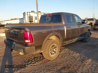 2017 Ram 1500 Rebel z VIN 1C6RR7YT0HS534465, wystawiony jako IAAI lot #41240431 z przebiegiem 125 886 mil mil oraz . Historia ofert i sprzedaży dostępna na DreamBid. Obrazek 4.