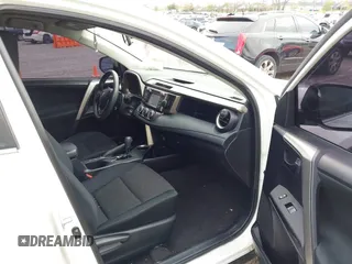 2014 Toyota RAV4 LE with VIN JTMBFREV2EJ006965, listed as a IAAI auction lot 41961470 with 194,881 mi miles and . Bid and sale history available at DreamBid. Image 5.