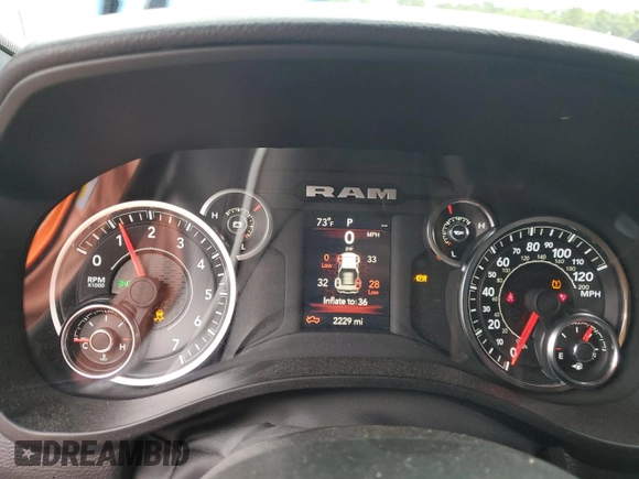 2023 Ram 1500 Tradesman with VIN 1C6SRFGT1PN666130, listed as a Copart auction lot 69990804 with 2,229 mi miles and Salvage title. Bid and sale history available at DreamBid. Image 9.
