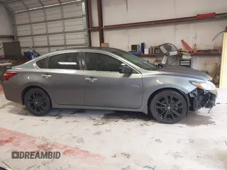 2018 Nissan Altima SR with VIN 1N4AL3AP1JC175694, listed as a IAAI auction lot 42006589 with 89,386 mi miles and . Bid and sale history available at carsss.com. Image 13.