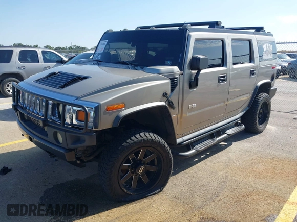 2003 Hummer H2 with VIN 5GRGN23U43H125114, listed as a IAAI auction lot 42160986 with 157,776 mi miles. Bid and sale history available at carsss.com. Image 19.