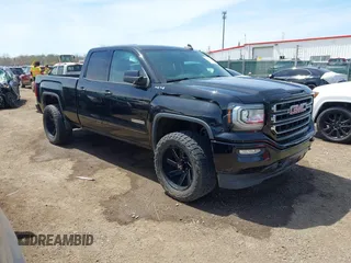 2017 GMC Sierra 1500 SLE z VIN 1GTV2MEC2HZ105964, wystawiony jako IAAI lot #42091941 z przebiegiem 93 779 mil mil oraz . Historia ofert i sprzedaży dostępna na DreamBid. Obrazek 1.