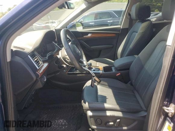 2021 Audi Q5 Premium Plus with VIN WA1BAAFY9M2108985, listed as a Copart auction lot 61656745 with 57,572 mi miles and Salvage title. Bid and sale history available at DreamBid. Image 7.