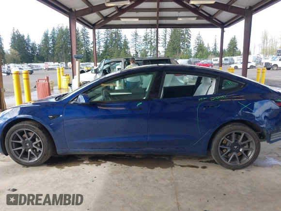 2022 Tesla Model 3 Long Range with VIN 5YJ3E1EB3NF267365, listed as a IAAI auction lot 41996594 with 32,687 mi miles and . Bid and sale history available at DreamBid. Image 15.