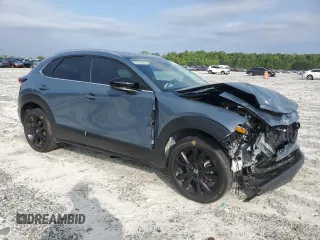 2024 Mazda CX-30 S Carbon Edition с VIN 3MVDMBCMXRM604194, выставлен на аукционе Copart как лот 54777125 с пробегом 9 816 миль миль и Списание • Salvage title. История ставок и продаж доступна на DreamBid. Изображение 4.