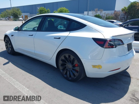 2022 Tesla Model 3 Performance with VIN 5YJ3E1ECXNF270238, listed as a IAAI auction lot 42173668 with 13,017 mi miles and . Bid and sale history available at DreamBid. Image 3.