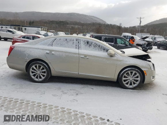 2014 Cadillac XTS Luxury z VIN 2G61M5S37E9304598, wystawiony jako IAAI lot #41006051 z przebiegiem 115 879 mil mil oraz . Historia ofert i sprzedaży dostępna na DreamBid. Obrazek 13.