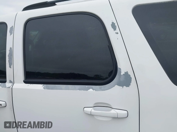2007 Chevrolet Tahoe LTZ with VIN 1GNFK13007J149042, listed as a IAAI auction lot 42593189 with 216,791 mi miles and . Bid and sale history available at DreamBid. Image 14.