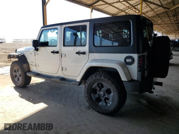 2018 Jeep Wrangler JK Unlimited Sahara with VIN 1C4HJWEG8JL938031, listed as a Copart auction lot 69769394 with 80,417 mi miles and Salvage Title. Bid and sale history available at carsss.com. Image 2.