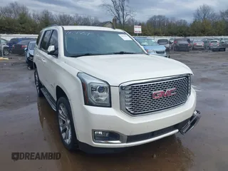 2015 GMC Yukon SLT with VIN 1GKS2BKC5FR243320, listed as a IAAI auction lot 41656459 with 172,999 mi miles. Bid and sale history available at carsss.com. Image 1.
