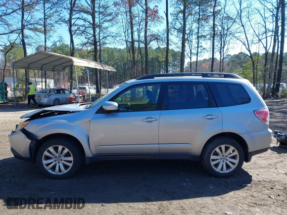 2012 Subaru Forester X Premium with VIN JF2SHBDC4CH445642, listed as a IAAI auction lot 41865977 with 136,838 mi miles and . Bid and sale history available at DreamBid. Image 14.