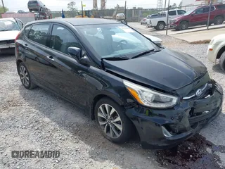 2015 Hyundai Accent Sport with VIN KMHCU5AE5FU233054, listed as a IAAI auction lot 41932298 with 70,278 mi miles. Bid and sale history available at carsss.com. Image 1.